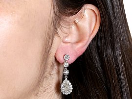 Wearing Pear Cut Diamond Drop Earrings