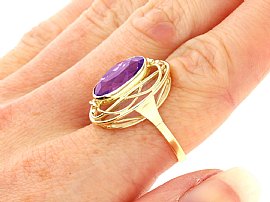 Model wearing Oval Amethyst Ring in Gold for Sale