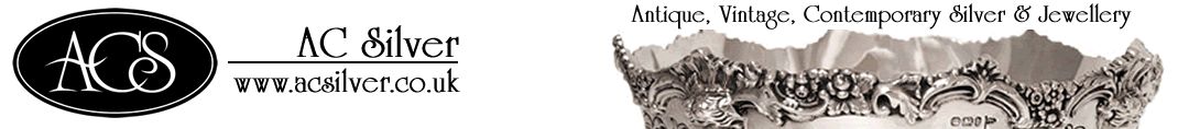 Page header image showing antique silverware
