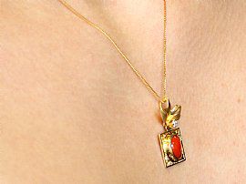Coral & Gold Pendant Wearing Neck