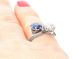 Blue Sapphire and Diamond Twist Ring Wearing Hand 