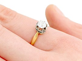wearing 14ct gold diamond solitaire ring
