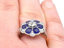 Blue Sapphire and Diamond Platinum Ring on hand