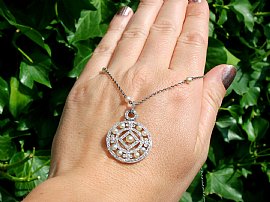 Antique Diamond and Pearl Pendant Outside Wearing on Hand