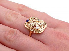 Sapphire and Gold Dress Ring Wearing Hand