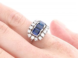 Sapphire Ring with Diamonds on the hand