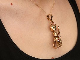 Gold Devil Pendant with Gemstones Wearing Image