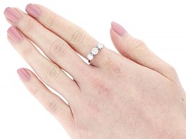 Classic Three Stone Engagement Ring Wearing Image