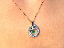 Pendant with Emerald on the Neck