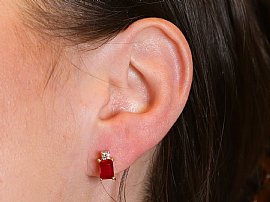 Emerald Cut Ruby Earrings UK Wearing 