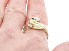 Gold Snake Ring Being Worn