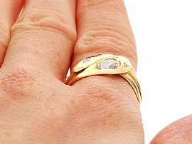Gold Snake Ring on the Hand