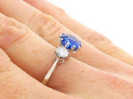 Sapphire Trilogy Ring on the Hand
