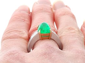 Wearing Emerald Solitaire Ring White Gold