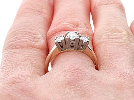 Wearing 0.64 Carat Three Stone Diamond Ring
