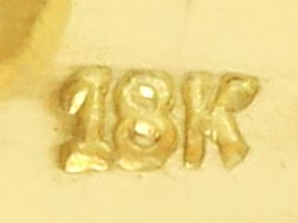 Diamond Snake Ring in 18k Yellow Gold Hallmark