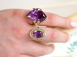 Oval Amethyst Ring in Gold on hand