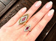 ruby and diamond rings on hand