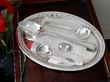 German silver salver with cutlery on