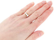 Trilogy Twist Ring in Yellow Gold wearing