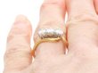 Trilogy Twist Ring in Yellow Gold being worn