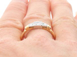 Gold and Diamond Ring on Finger