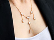 wearing a moonstone necklace