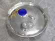Silver Waiter with a caddy spoon and mirror on it
