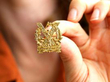 gold regimental brooch