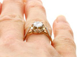 diamond solitaire ring  on finger