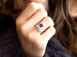 sapphire ring with diamonds on hand
