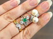 gemstone rings on finger