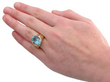 blue topaz yellow gold ring wearing