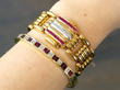 gemstone bracelets being worn