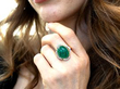 wearing Cabochon Cut Emerald Ring