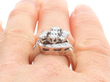 white gold diamond cluster ring being worn