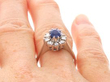 sapphire diamond ring on finger