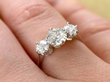 diamond trilogy ring on finger
