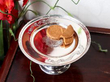 Silver Paten with biscuits on