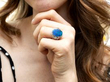 black opal ring being worn