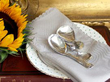 Silver Caddy Spoons on Plate