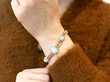 Antique opal and diamond bracelet wearing