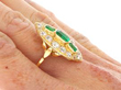 1930's emerald ring with diamonds on hand