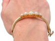Victorian Opal Bangle in gold on wrist