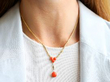Gold Coral Necklace On Neck