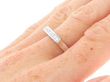 Unusual Half Eternity Ring in White Gold on hand