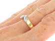 vintage solitaire twist ring in gold on hand