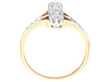 antique vertical trilogy ring setting