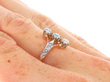 antique vertical trilogy ring on hand