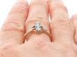antique vertical trilogy ring on finger